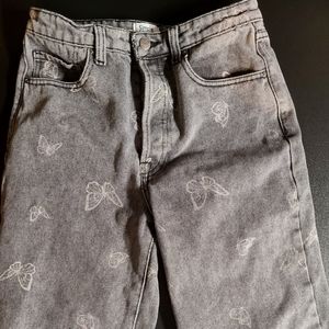 Acid washed butterfly straight leg jeans
